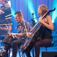 Arena-Style Rock Concert And String Quartet Recital Combine For Break Of Reality At A