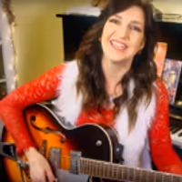 VIDEO: Karen Volpe Releases New Music Video for 'Christmas Came Rushing' - Written… Video