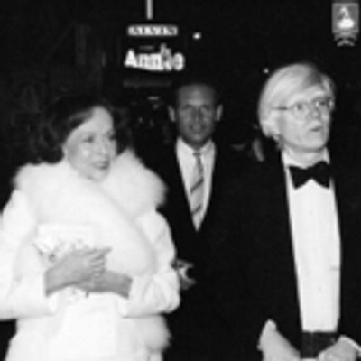 Photo Throwback: Paulette Goddard and Andy Warhol Check Out ANNIE in 1977