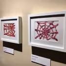 Sticker Art Exhibition Explores Gender Roles