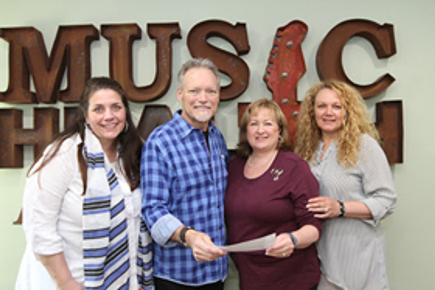 Grammy Winning Artist, John Berry Presents Check From “We All Come Together' Benefit to Music Health Alliance Grammy Winning Artist, John Berry Presents Check From “We All Come Together' Benefit to Music Health Alliance Image