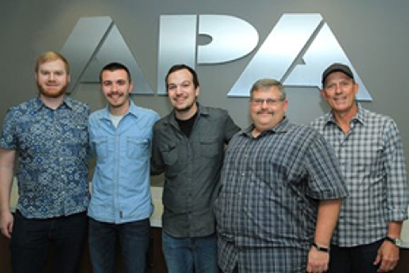 Crawford & Power Signs Exclusive Booking Representation with APA  Image