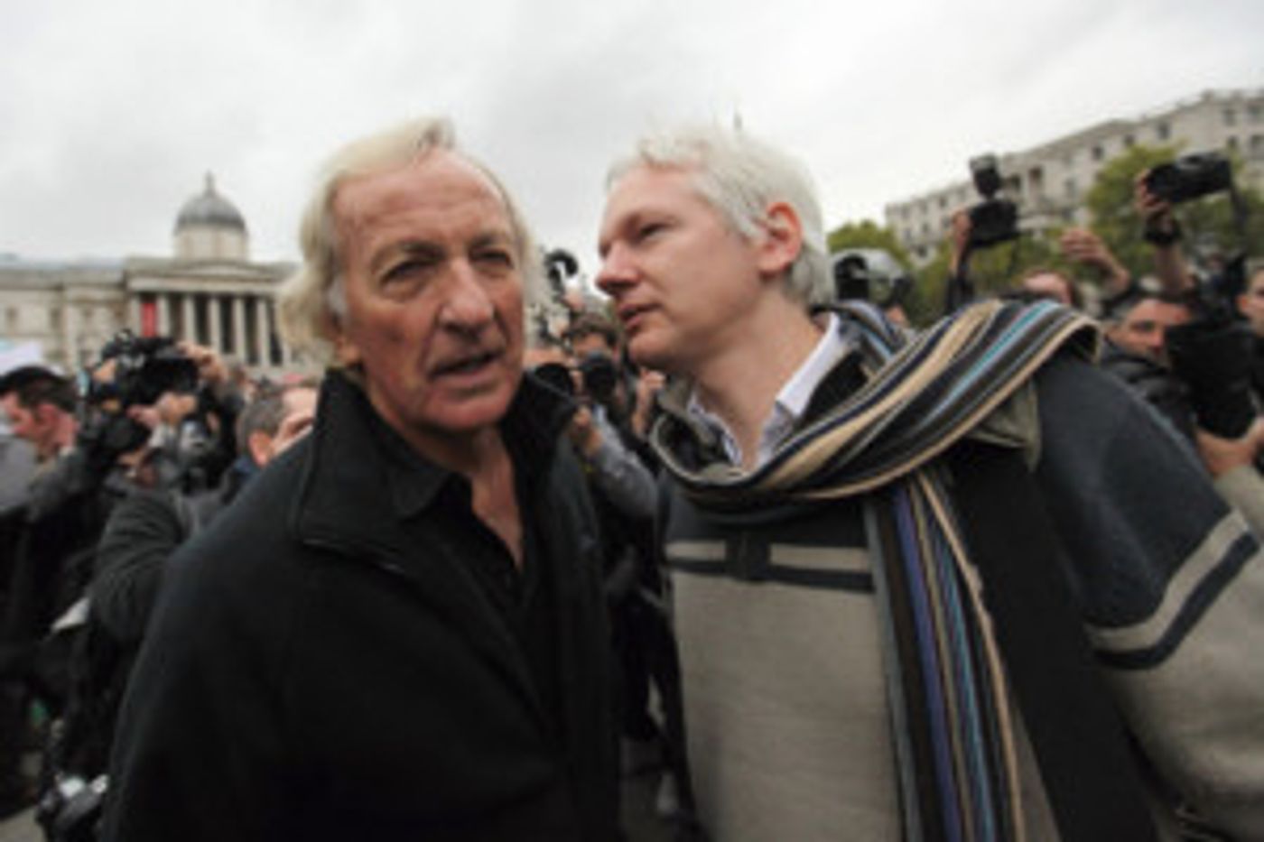 Director John Pilger Defends Julian Assange On Tom Needham's THE SOUNDS OF FILM  Image
