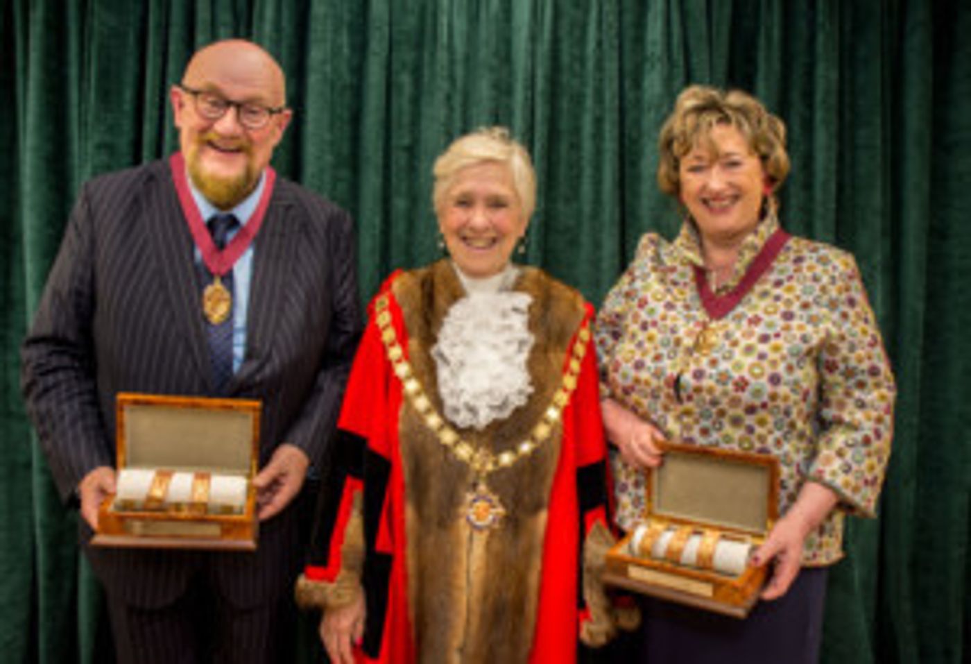 Sir Howard Panter and Dame Rosemary Squire DBE awarded Honorary Freedom of the Borough in Woking  Image