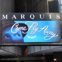 UP ON THE MARQUEE: COME FLY AWAY!