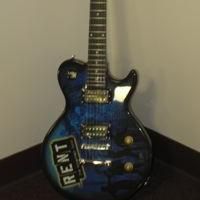 TWITTER WATCH: Rent Tour - '28 hours left to bid on the limited edition RENT guitar!'