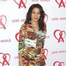 Daphne Rubin Vega Visits AIDS Charity in Manhattan
