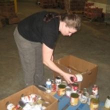 Dallas Theater Center Staff and A Christmas Carol Cast Volunteer at NTFB Warehouse