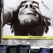 Artist Posts Larger Than Life Photos of Tupac, Snoop Dogg Around NYC