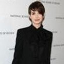 Anne Hathaway Carries Jill Milan Clutch to NBR Awards Gala