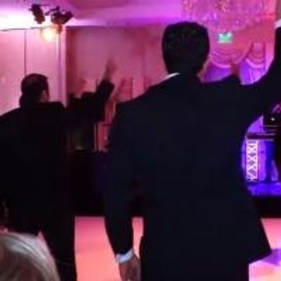 VIDEO: Groomsmen Surprise Bride with Choreographed Dance to Backstreet Boys, Beyonce, and Bruno Mars