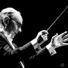 Composer and Conductor Ennio Morricone Suffers Back Injury; Postpones LA, Brooklyn…