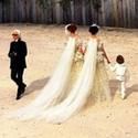 Chanel Couture Show Closes With Two Brides In Support of French Marriage Equality Law