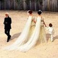 Chanel Couture Show Closes With Two Brides In Support of French Marriage Equality Law