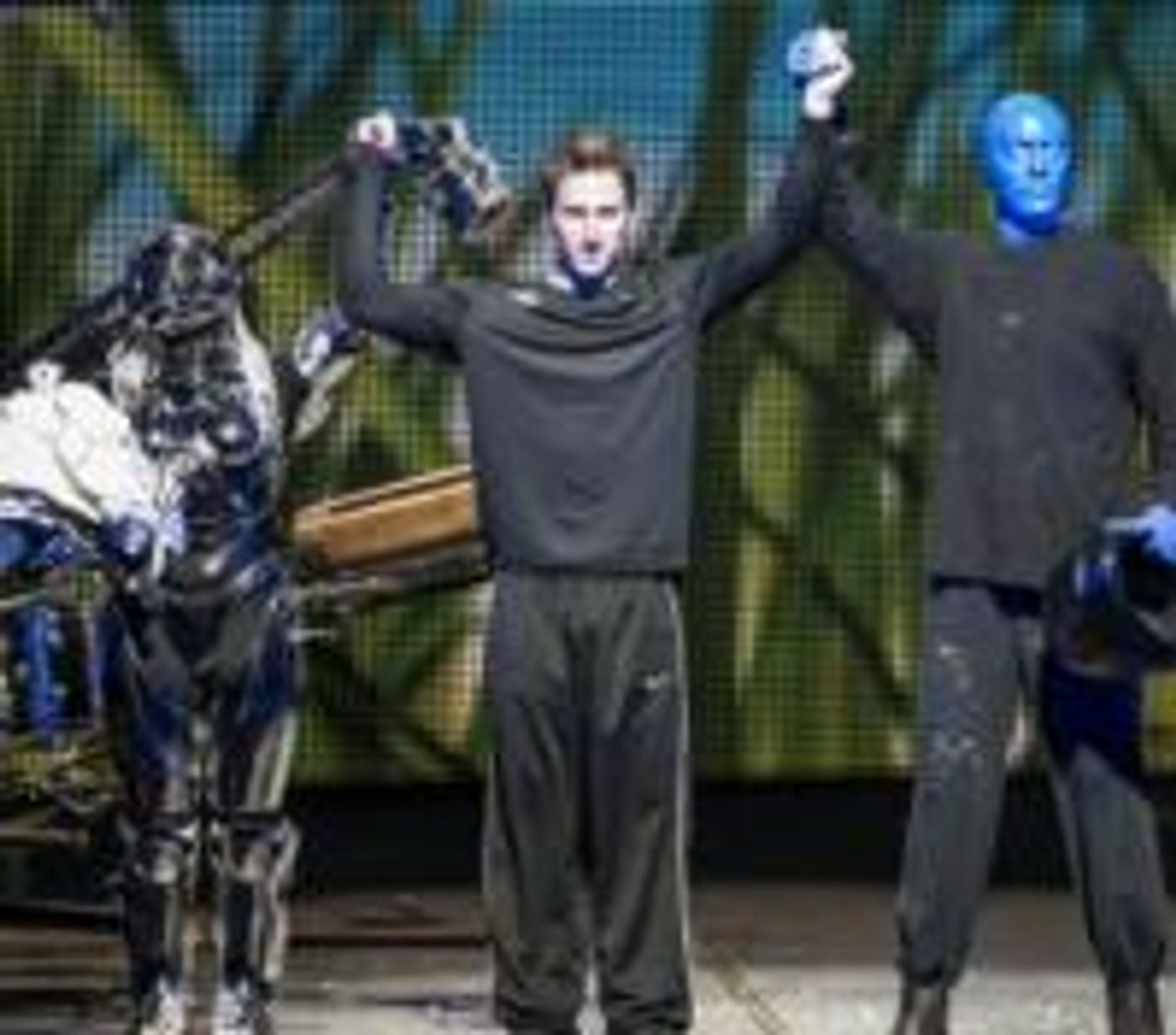 Photo-Flash-Blue-Man-Group-Hosts-Boise-State-University-and-University-of-Washingtons-Football-Teams-at-MAACO-Bowl-Las-Vegas-Official-Show-Night-20000101