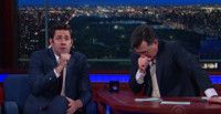 VIDEO: Watch John Krasinski & Stephen Colbert Fake Vomit While Reciting… Video
