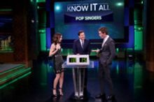 VIDEO: Eddie Redmayne & Lily Collins Face Off in Game of 'Know It All'