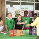 Girl Scouts of the USA Celebrates 100 Years of Girl Scouts Selling Cookies