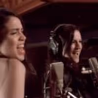 VIDEO: Arielle Jacobs and Carrie Manolakos Join Peter Dinklage, Coldplay in 'Red… Video