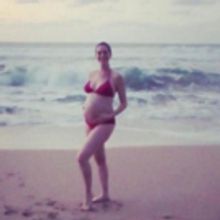 PHOTO: Anne Hathaway Beats Paparazzi to the Punch by Sharing First Baby Bump Pic