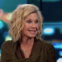 VIDEO: Olivia Newton John Weighs In On Bizarre GREASE Fan Theory: 'I Found It… Video