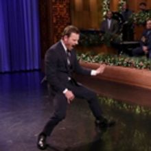 VIDEO: Michael Fassbender & Jimmy Fallon Face Off in Air Guitar Battle