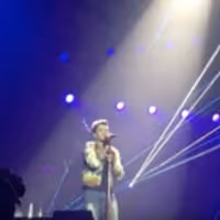 VIDEO: Adam Lambert & Queen Dedicate 'Who Wants To Live Forever' Performance to… Video