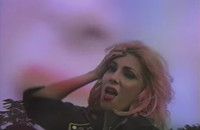 VIDEO: Bonnie McKee Debuts Voyeuristic Music Video for 'Thorns' Shot Entirely on VHS Video