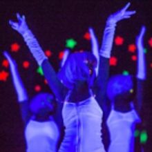 Pretty Peacock Productions Presents NEON DREAMS: Absinthe, A Black Light Cabaret