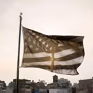 Robert Longo's 'Pledges of Allegiance' Flag Raised by 10 Institutions Nationwide