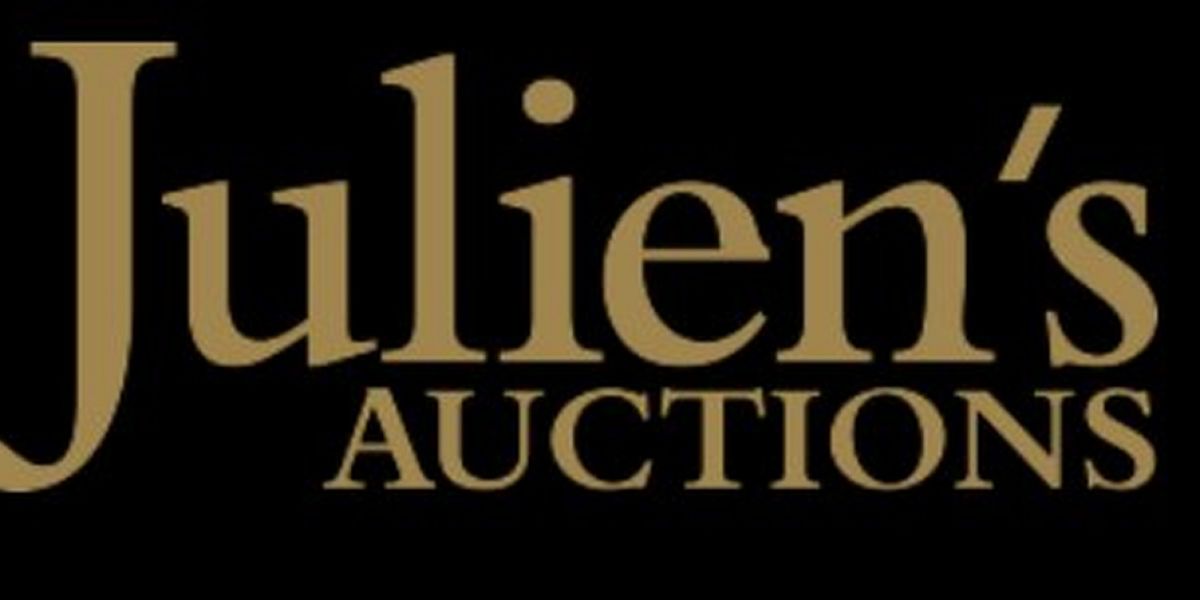 Kurt Cobain's Smashed & Signed By Nirvana Fender Stratocaster Electric Guitar Sold For $595,900