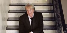 John Tesh Opens Up About Criminal Behavior, Fast Breaks, and His SONGS & STORIES FROM