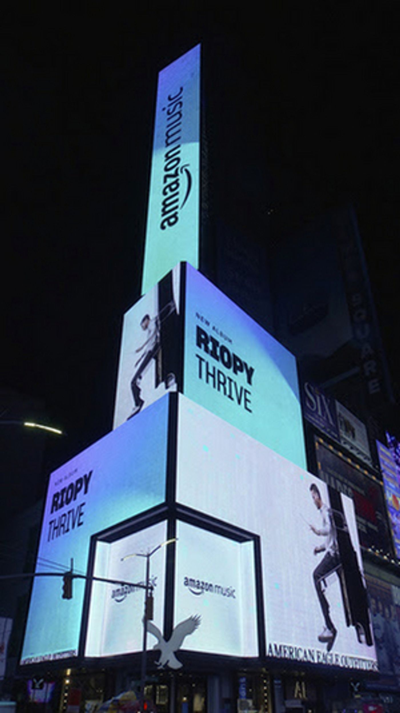 French-English Pianist RIOPY Featured on Amazon Music Times Square Billboard  Image