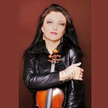 La Violinista Erika Dobosiewicz, Académica Y Reconocida Violinista De La Orquesta De