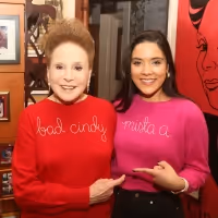 Photos: Linedy Genao Gifts Cindy Adams a BAD CINDERELLA 'Bad Cindy' Sweater