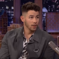 VIDEO: Nick Jonas Reacts to That Spinach in His Teeth During the Grammys on THE…