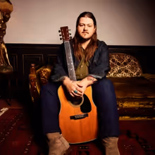 Vincent Neil Emerson Reflects On His Early Touring Days On 'Time Of The Rambler'