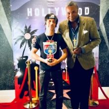 VIDEO: Darryl Maximilian Robinson Presents A Street Theatre Rendition Of Rudyard Kipl