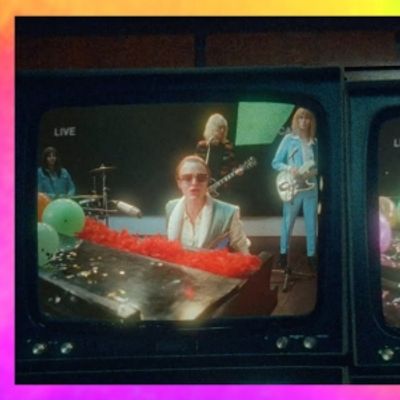 Video: Cara Delevingne Stars as Elton John in New Video for 'Step Into Christmas'