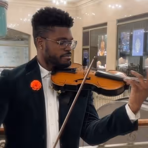 Video: Violinist Edward W. Hardy Performs Ariana Grande, Queen, Puccini & More At His Subway Series