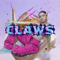 Charli XCX Parties In An Alternate Dimension In The Video For 'Claws'