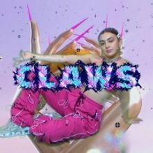 Charli XCX Parties In An Alternate Dimension In The Video For 'Claws'