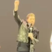 Video: John Travolta Surprises Fans as 'Danny Zuko' at GREASE Sing-Along