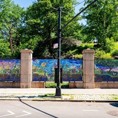 FROM ROOT TO BLOOM Mural by Singha Hon Now on View at Marcus Garvey Park Gates
