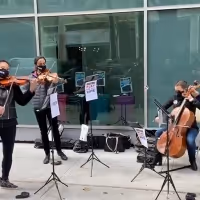 VIDEO: Met Orchestra Musicians Play Near Polling Station by Lincoln Center