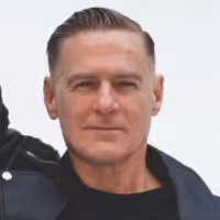 VIDEO: Bryan Adams & John Cleese Share 'Kick Ass' Music Video