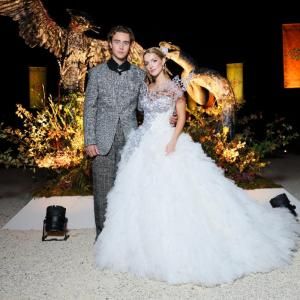 Photos: THE HUNGER GAMES: SUNRISE ON THE REAPING Stars Attend Paris Fashion Exhibitio