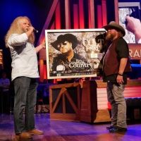 Jamey Johnson Surprises Colt Ford at the Grand Ole Opry with RIAA Award