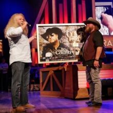 Jamey Johnson Surprises Colt Ford at the Grand Ole Opry with RIAA Award