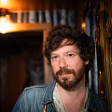 Listen: John Gallagher Jr. Shares Road Anthem 'Mitsuko' From Forthcoming EP